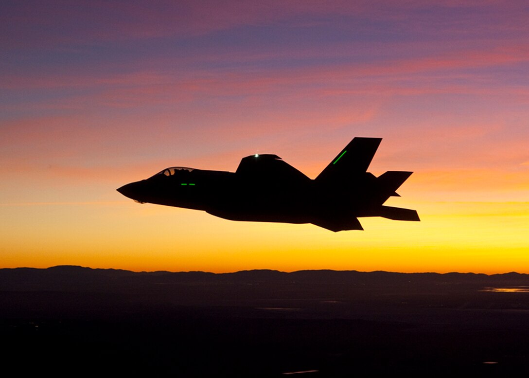 The first night flight in the history of the Lockheed Martin F-35 Program was completed Jan. 18 at Edwards Air Force Base, Calif.  The mission consisted of a series of straight-in approaches in twilight and darkness.  The pilot also performed an evaluation of the F-35's cockpit lighting which Ward called, "the best he's ever seen."  The testing will clear the way for night refueling and formation testing later this year.  (Lockheed Martin photo)  

 

(Lockheed Martin photos by Tom Reynolds and Darin Russell)
