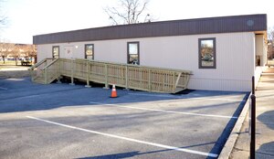 The 11th Comptroller Squadron moved to this temporary building on Colorado Avenue, between F and D Streets.  Their hours of operation are from 8 a.m. to 3 p.m. weekdays, except for Tuesday, when they close at 2 p.m.  Their phone number, (240) 857-6377, is also unchanged.  ( U.S. Air Force photo/Senior Airman Torey Griffith)