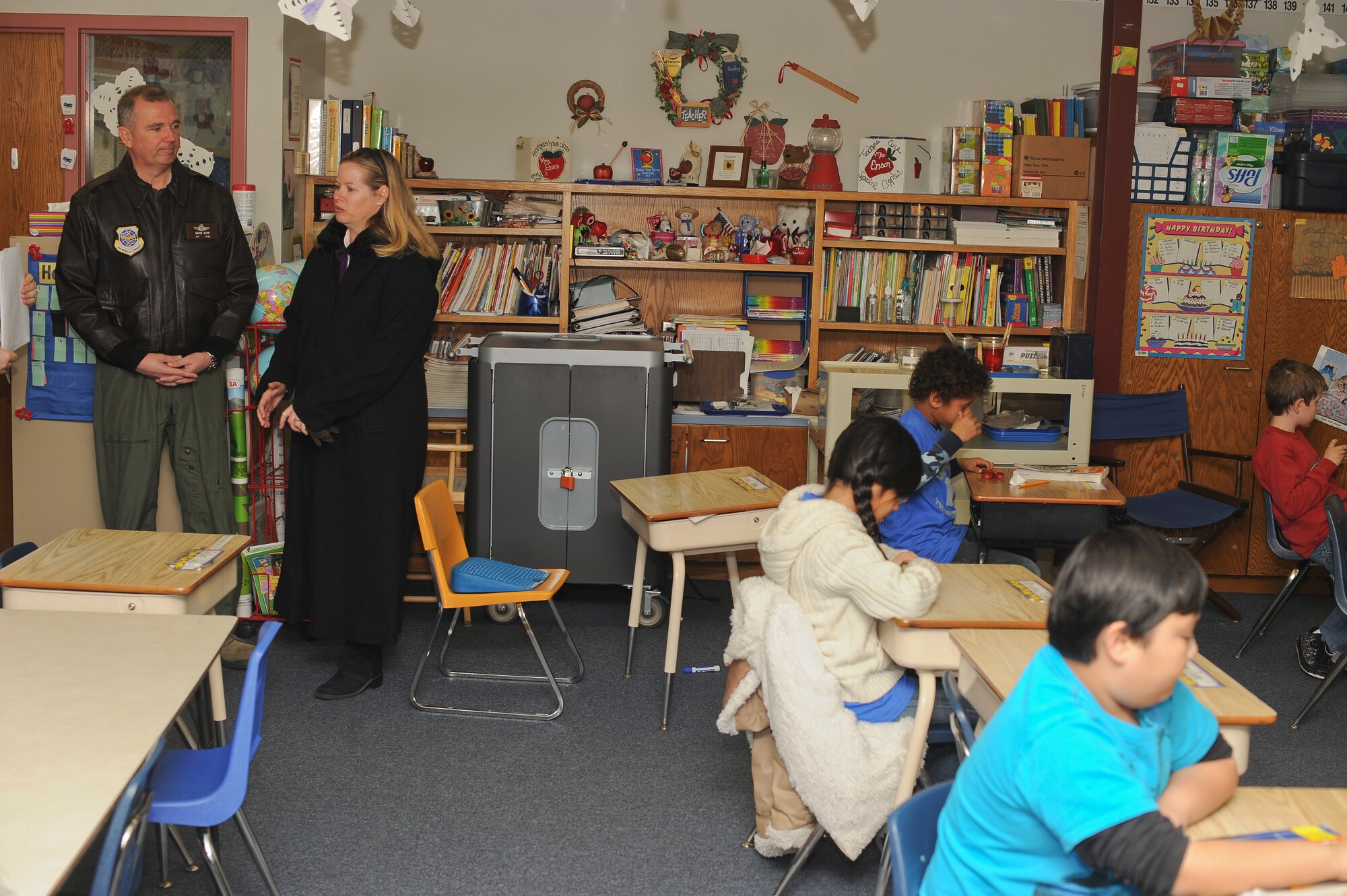 Col. Ricky Rupp, 22nd Air Refueling Wing commander, and Charolette Rupp, his wife, visit a classroom during a tour of Wineteer Elementary School Jan. 17, 2012, Wichita, Kan.  With approximately 70 percent of the students having a military tie, Rupp viewed how McConnell Air Force Base, Kan., affects the school.  (U.S. Air Force photo/Airman 1st Class Jose L. Leon)