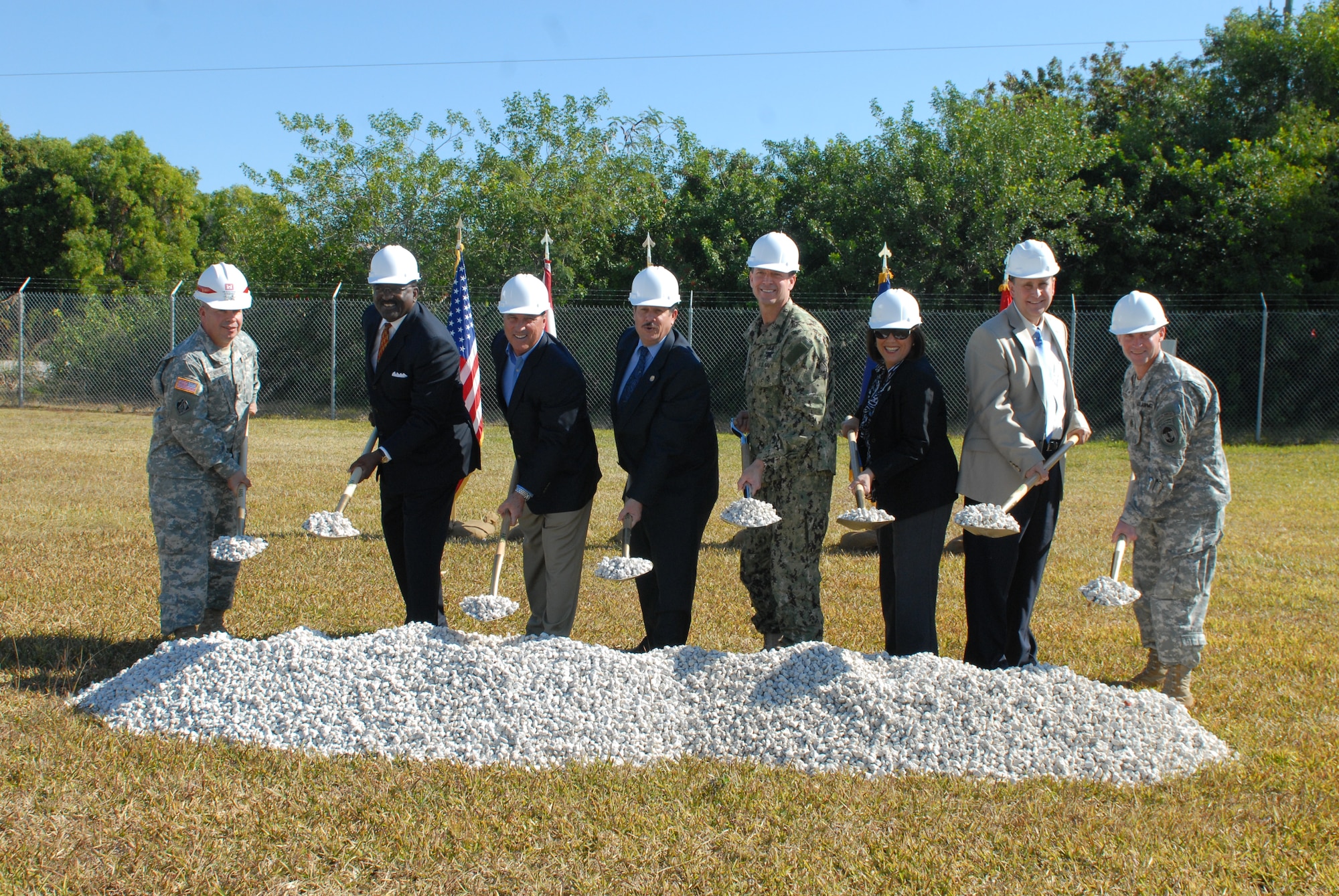 (Far Left) Maj. Gen. Todd T. Semonite, Commander of the U.S. Army Corps of Engineers South Atlantic Division, Miami-Dade County commissioners, Homestead Mayor Steve Bateman, joined Navy Rear Adm. Thomas L. Brown II (center), the commander of Special Operations Command South, and Command Sgt. Maj. Donald White (far right), SOCSOUTH Senior enlisted advisor, pose as they formally welcome the beginning of construction for the new SOCSOUTH Headquarters Building, Jan 10 at Homestead Air Reserve Base, Fla. The new 125,000-square foot, $41 million headquarters facility will be designed to host more than 400 people representing all branches of the armed forces. The new facility will be LEED-certified and is expected to be completed in three years. (Department of Defense photo by Army Sgt. 1st Class Alex Licea, SOCSOUTH Public Affairs)