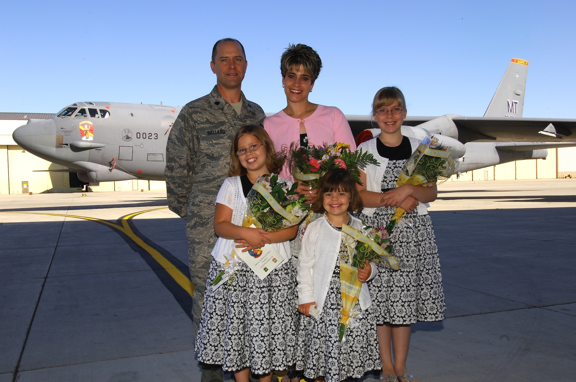 MINOT AIR FORCE BASE, N.D. -- A 5th Maintenance Group key spouse mentor, Stephanie Ballard, received the Joan Orr Spouse of the Year award for her efforts in base and community activities and voluntary service. Ballard is pictured here with her husband, Lt. Col. Patrick Ballard, 5th MXG deputy commander, and their three children, Tarryn, Kaitlyn, and Julia. (Courtesy photo)