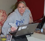 Maj. Shannon Mann, 916th Public Affairs officer, teleworks from her at-home office thanks to an enhanced telework policy passed by Congress in 2010. The enhanced policy was initially established to allow for continuation of operations during global health crisis, but has broader benefits for organizations and employees. (Courtesy photo)