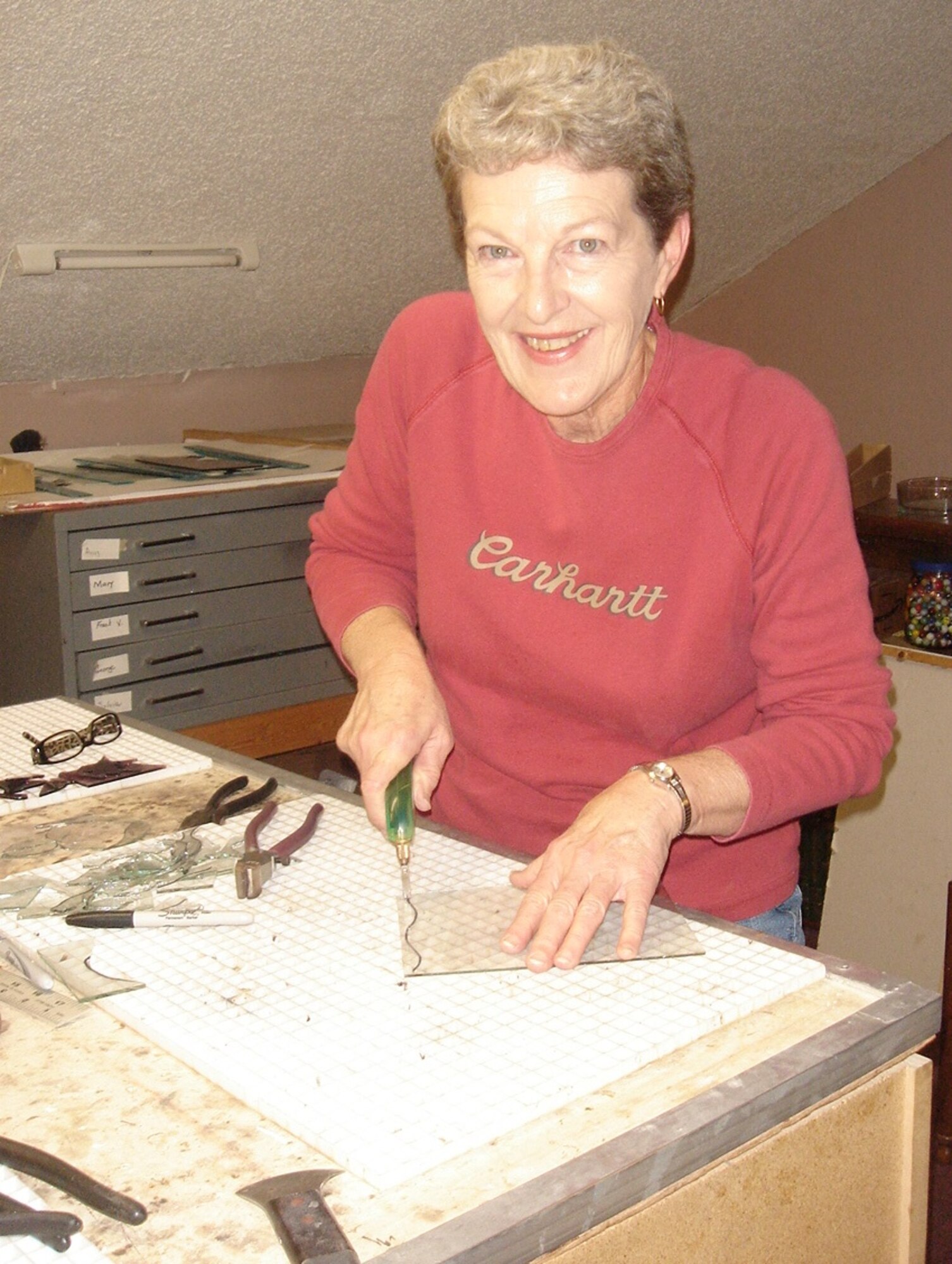 Peggy Gray, AEDC’s deputy director of financial management (FM) and comptroller, is shown here taking her first art class on stained glass, one of many creative endeavors she hopes to pursue upon her retirement Feb. 1. (Photo provided)