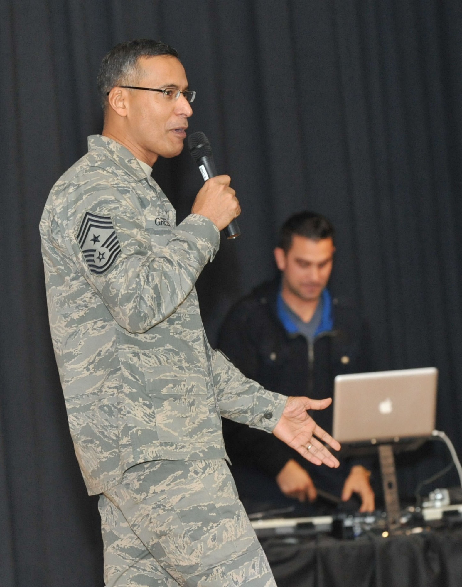 Chief Master Sgt. Terrence Greene, 87th Air Base Wing command chief, greets the Joint Base McGuire-Dix-Lakehurst children and parents Jan. 11 at the Timmermann Center during the “iCarly” event. Greene introduced the cast shortly after greeting the community. The children let out an ecstatic cheer at the sight of the cast, leaving their parents ears ringing. (U.S. Air Force photo by Wayne Russell/Released