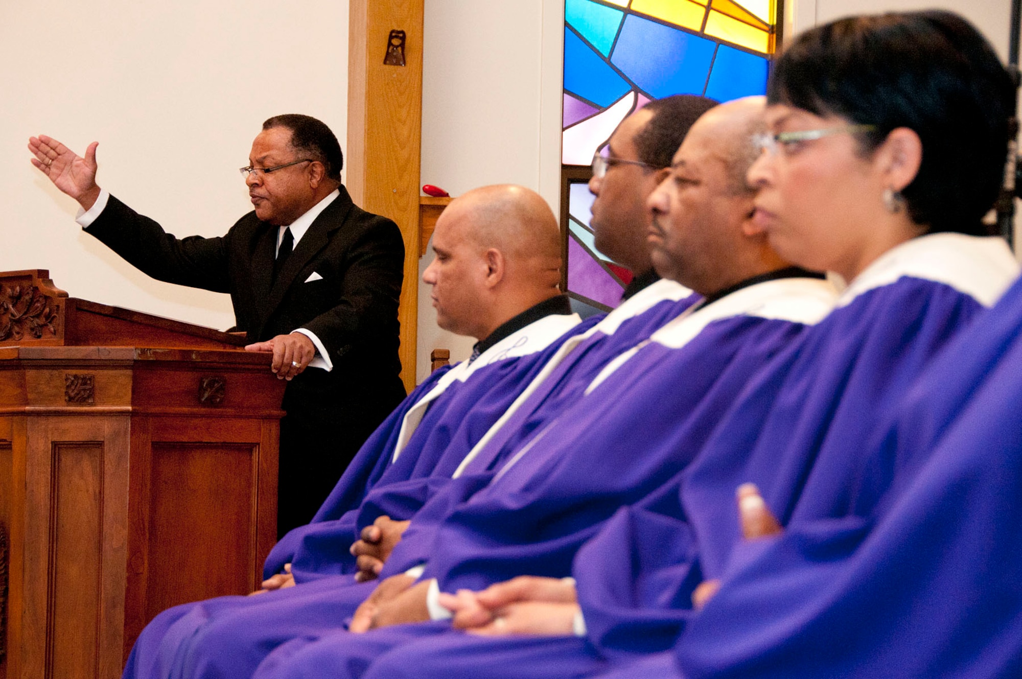 HANSCOM AIR FORCE BASE, Mass. – Timothy Martin (left) performs a dramatic reading of the Dr. Martin Luther King Jr. “I Have a Dream” speech at a celebration at the base chapel on Jan. 12 as members of the Unified Voices of New England look on. Base members gathered at the chapel to remember King and to celebrate his life.  (U.S. Air Force photo by Mark Wyatt)
