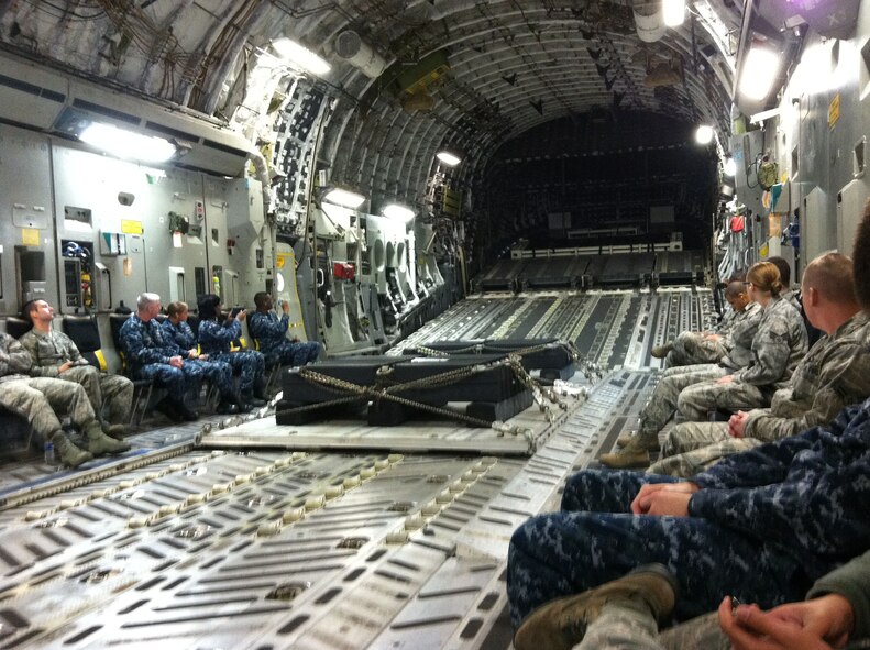 Sailors, Airmen and civilian personnel at Joint Base Charleston, S.C.,  earned an opportunity to fly in a C-17 Globemaster III as a reward to their exceptional work and dedication with their respective squadrons. The quarterly incentive flight was held Jan. 12, 2012. (U.S. Air Force Photo/Airman 1st Class Tom Brading)