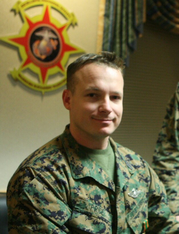 Petty Officer 1st Class Raymond R. Price, a corpsman with the Group Aid Station, 2nd Marine Logistics Group, poses for a photo during a ceremony at the 2nd MLG headquarters building aboard Camp Lejeune, N.C., Jan. 20, 2012. During the ceremony Price received the 2011 2nd MLG Senior Sailor of the Year award for his outstanding achievements and performance during the past year. (U.S. Marine Corps photo by Pfc. Franklin E. Mercado)