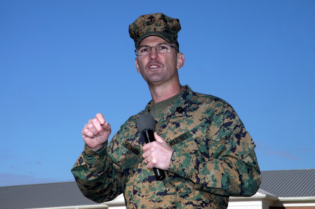 Sgt. Maj. Thomas E. Sherwood, former sergeant major of Headquarters and Headquarters Squadron of Marine Corps Air Station Cherry Point, speaks to guests at his relief and appointment ceremony Jan. 20, 2012 on the MCAS Cherry Point parade field. Sherwood was relieved by Sgt. Maj. Prafke, former sergeant major of Marine Tactical Electronic Warfare Squadron 3, an EA-6B Prowler squadron aboard the air station, and she has previously served with H&HS as the director of the Corporal's Course leadership school.