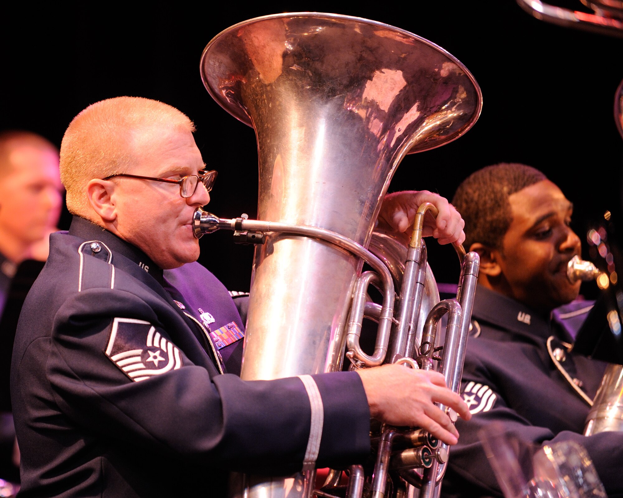 U.S. Air Force Master Sgt. Chris Quade, a tubist with the U.S. Air Force Band Ceremonial Brass and West Palm Beach, Fla., native, performs during a concert in Palm Beach Gardens, Fla., Jan. 20, 2012.  The Ceremonial Brass is on their first American concert tour playing venues throughout Florida. U.S. Air Force photo by Master Sgt. Adam M. Stump/RELEASED.