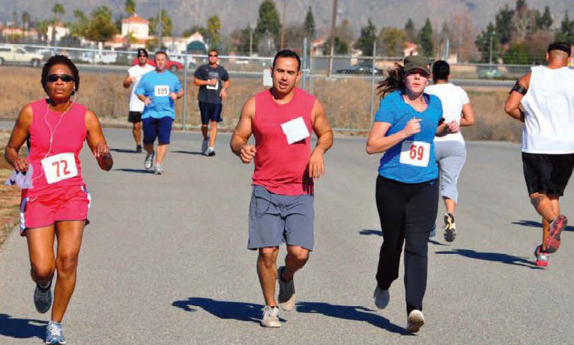 Team March members participate in the Fitness Center’s 5K/10K run/walk Tuesday, Jan. 10. Men’s 5K top three were Staff Sgt. Ishmael Bryant, 912 ARS, Senior Airman Joseph William and Staff Sgt. Sonny Madrid, 452 AMXS/Honor Guard. Women’s 5K top three were Christi Price, 163 RW contractor, Master Sgt. Cyndie Sartin, 163 OG and Staff Sgt. Adriana Garcia, 163 RW/Honor Guard. The 10K top three were Capt. Les McPeak, 163 RS, Tim Hecke, 452 FSS and retiree Dino Asuncion. The top three walkers were Master Sgts. Shawn Sones and Serman Harris, 701 COS and retiree Ernie Roxy. U.S. Air Force photo / Linda Welz
