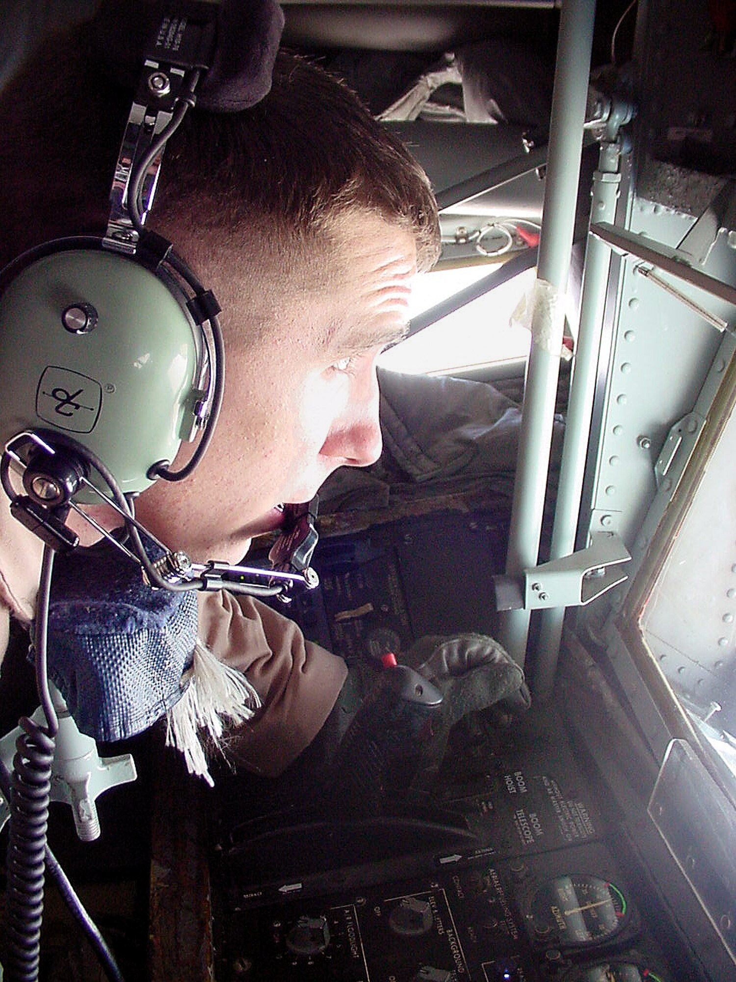 Airman 1st Class Richard McFadden prepares to refuel an aircraft over Iraq on Sept. 30, 2003. McFadden is a KC-135R Stratotanker boom operator assigned to the 340th Expeditionary Air Refueling Squadron at an undisclosed base in Southwest Asia. He was deployed from the 92nd Air Refueling Wing at Fairchild Air Force Base, Wash. (U.S. Air Force photo by Master Sgt. Scott T. Sturkol)