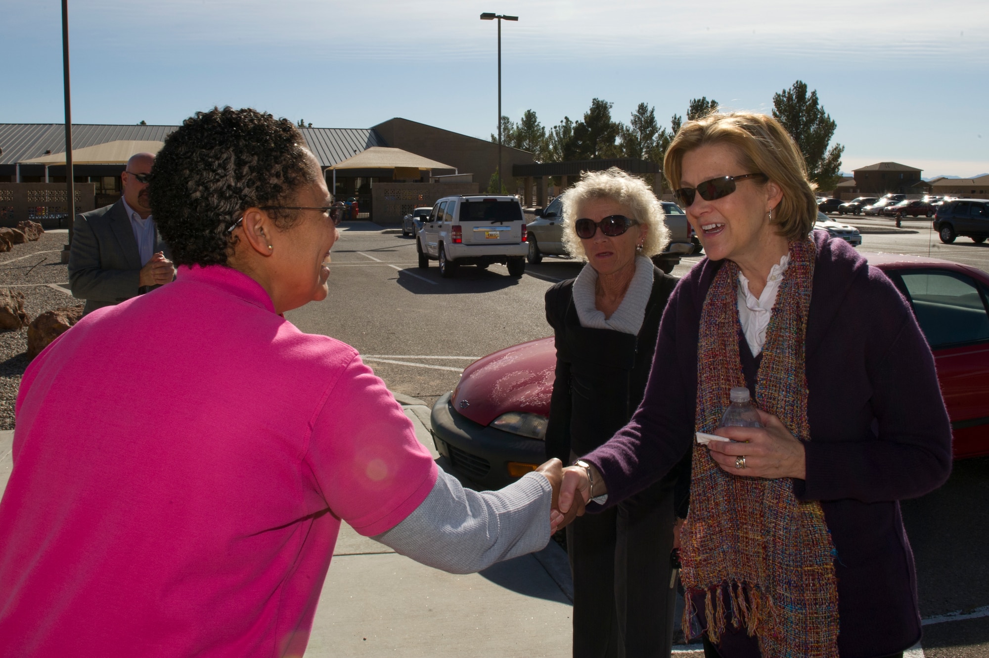 HOLLOMAN AIR FORCE BASE, N.M. -- Stephanie Mahoney, Youth Center school age coordinator, greets Kim Rand, wife of U.S. Air Force Lt. Gen. Robin Rand, 12th Air Force commander, at the Youth and Teen Center here Jan. 18. Rand accompanied her husband on his first trip to Holloman and visited with different base agencies. (U.S. Air Force photo by Senior Airman Kasey Close/Released)