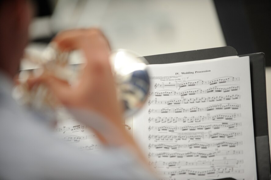 U.S. Air Force Tech. Sgt. Nathan Clark, a trumpeter with the U.S. Air Force Band Ceremonial Brass Quintet and a Glen Rock, Pa., native, plays "Wedding Procession" during a clinic at Palm Beach Atlantic University in West Palm Beach, Fla., Jan. 20, 2012.  The clinic involved the members of the Ceremonial Brass Quintet playing five pieces for the students, answering questions, and then working with the university's brass quintet to improve their playing style.  U.S. Air Force photo by Master Sgt. Adam M. Stump/RELEASED.