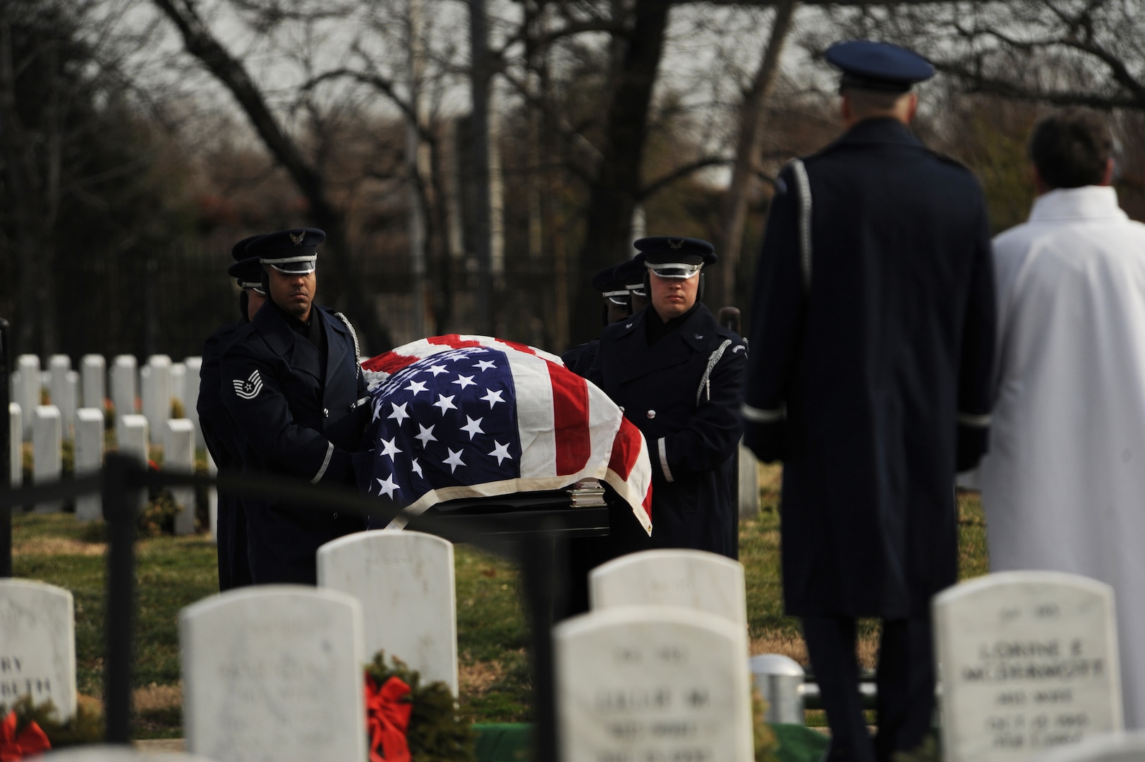 Members of the U.S. Air Force Honor Guard deliver the casket of retired Lt. Col. Luke Weathers Jr. to the burial site Jan. 20, 2012, at Arlington National Cemetery, in Virginia. Weathers was an original Tuskegee Airman who shot down two German planes during World War II. (U.S. Air Force photo/Tech. Sgt. Mareshah Haynes)