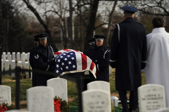 Members of the U.S. Air Force Honor Guard deliver the casket of retired Lt. Col. Luke Weathers Jr. to the burial site Jan. 20, 2012, at Arlington National Cemetery, in Virginia. Weathers was an original Tuskegee Airman who shot down two German planes during World War II. (U.S. Air Force photo/Tech. Sgt. Mareshah Haynes)