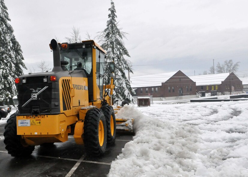 The McChord Field Fitness Center parking lot is cleared following a winter storm which accumulated more than nine inches of snow Jan. 20, 2012, at Joint Base Lewis-McChord, Wash. (U.S. Air Force photo/Airman 1st Class Leah Young)