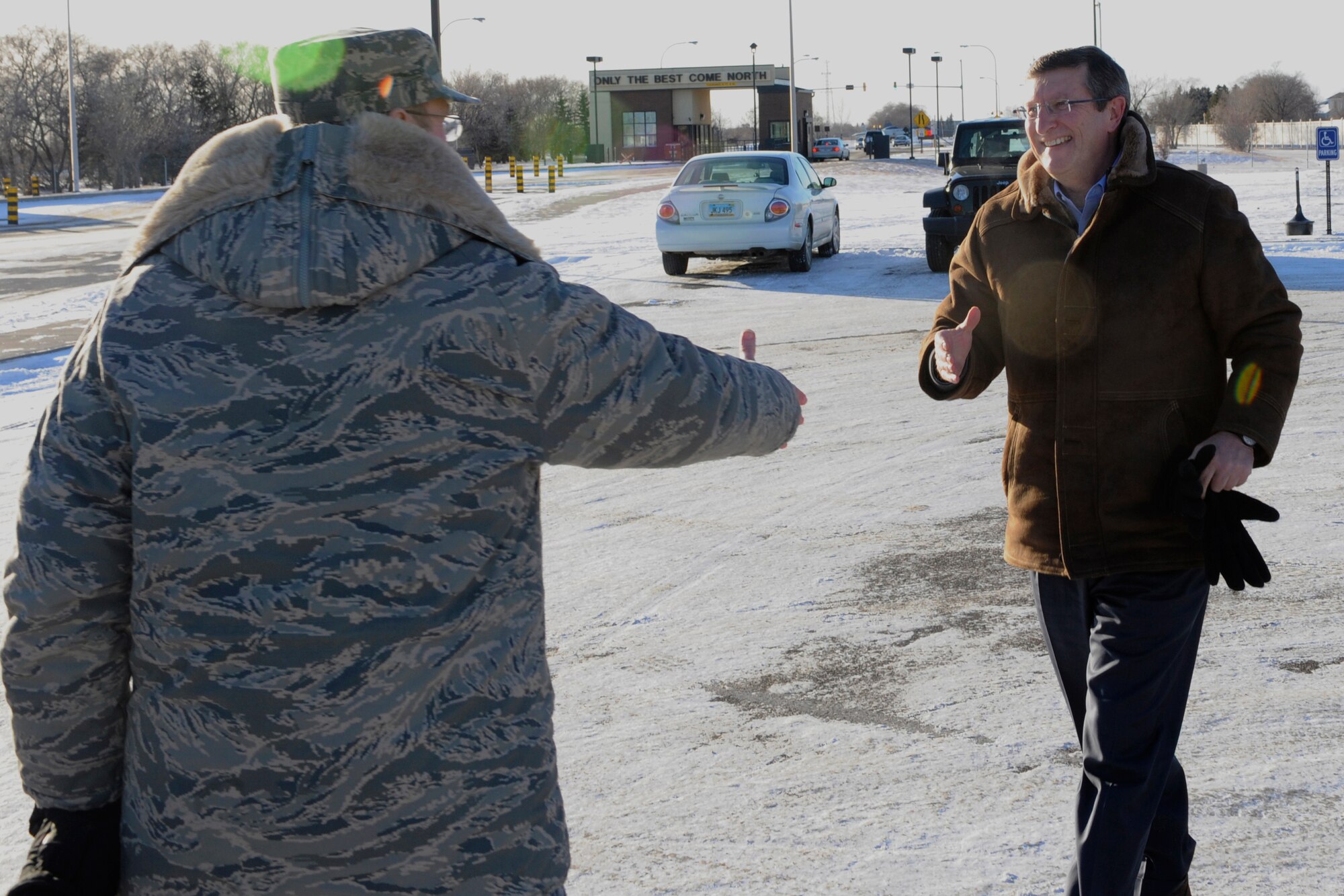 MINOT AIRFORCE BASE, N.D -- Col. Thomas Summers, 91st Missile Wing vice commander, greets North Dakota Sen. Kent Conrad on his arrival here Jan. 19. The senator visited the base to take part in a tour of the 91st MW's newest military construction project, the Missile Operations Building, which was recently unveiled. (U.S. Air Force photo/Senior Airman Desiree W. Esposito)