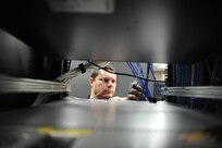 John Hipp, 902nd Communications Squadron information protection officer, checks a mainframe computer for vulnerabilities at the 902nd Communications Squadron on Joint Base San Antonio-Randolph Jan. 18. 902nd CS is JBSA-Randolph's first line of defense against cyber attacks. (U.S. Air Force photo/Rich McFadden) (released)
