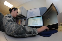 Senior Ainman Rachel Meyer, 902nd Communications Squadron client support center, opens a trouble ticket for a customer at the 902nd Communications Squadron on Joint Base San Antonio-Randolph Jan. 18. 902nd CS is JBSA-Randolph's first line of defense against cyber attacks. (U.S. Air Force photo/Rich McFadden) (released)