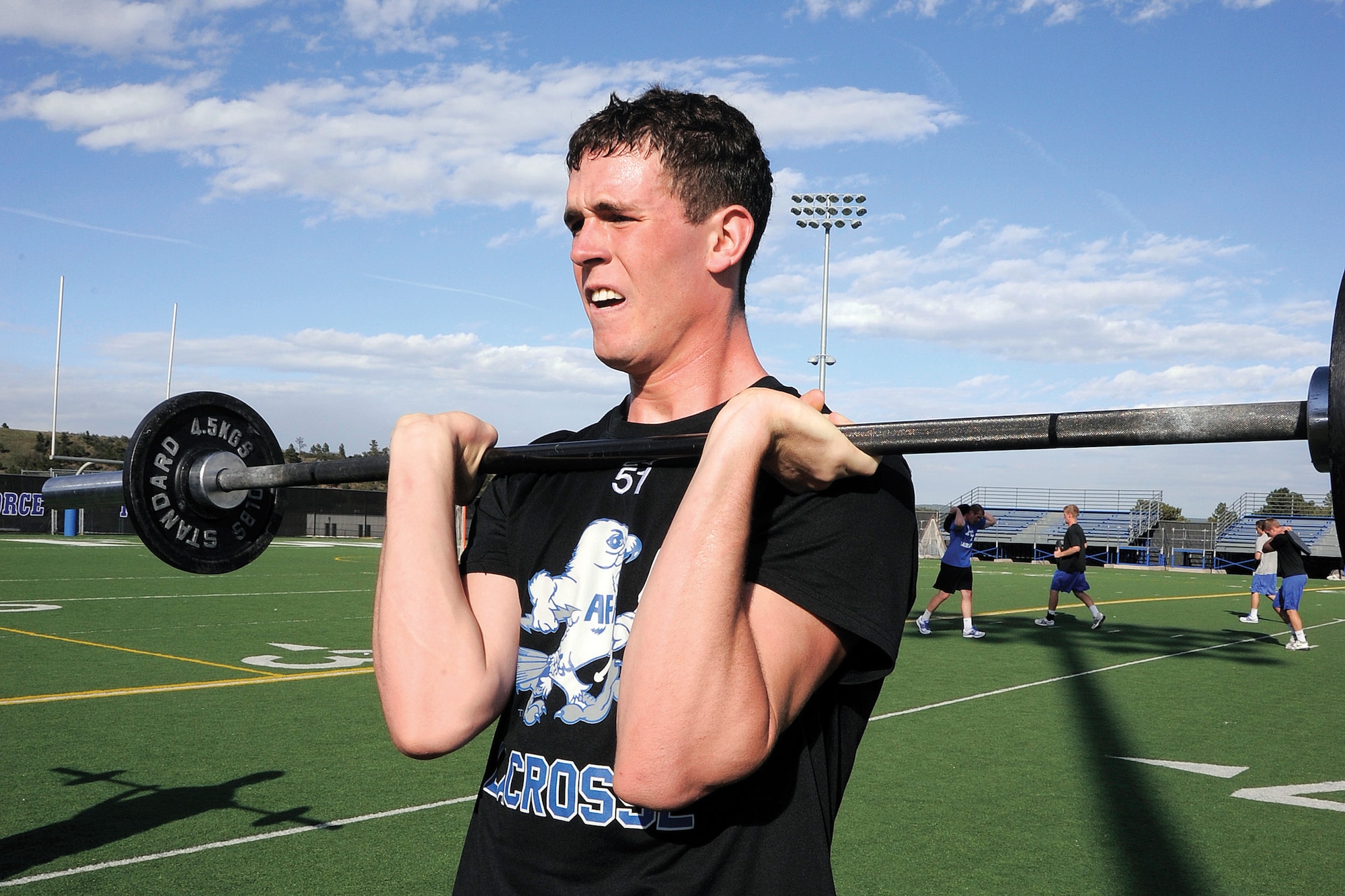 Cadet 2nd Class Pat Harrison, Cadet Squadron 4, participates in a Combat Conditioning Club Crossfit workout in September, 2011.(U.S. Air Force Photo/Mike Kaplan)