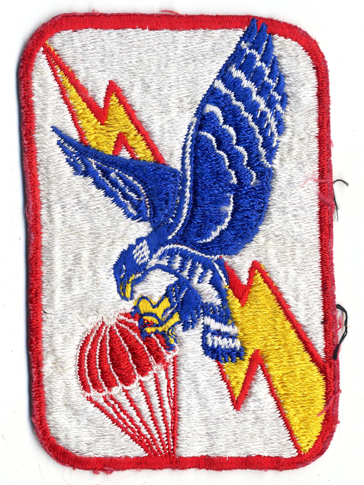 Later informal emblem of the USAF’s 6593rd Test Squadron, which operated C-119 and C-130 aircraft to catch satellite payloads in midair. (U.S. Air Force photo)