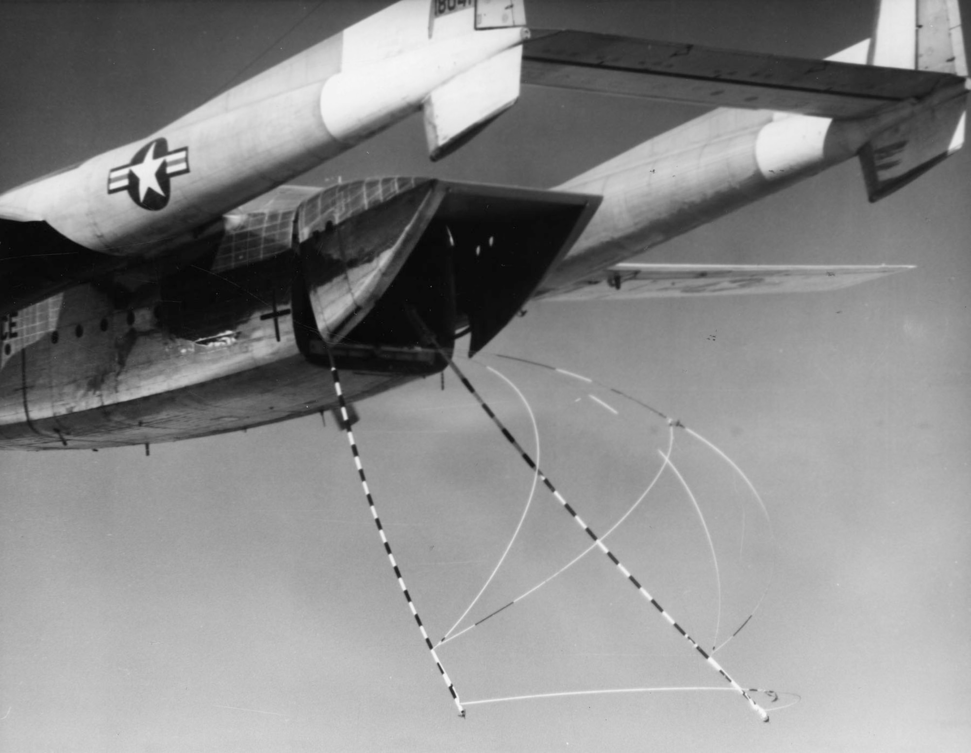 Satellite catching gear deployed from an Air Force C-119J. These aircraft recovered CORONA satellite film capsules beginning in 1960, and later gave way to the faster, more powerful C-130 Hercules aircraft. (U.S. Air Force photo)