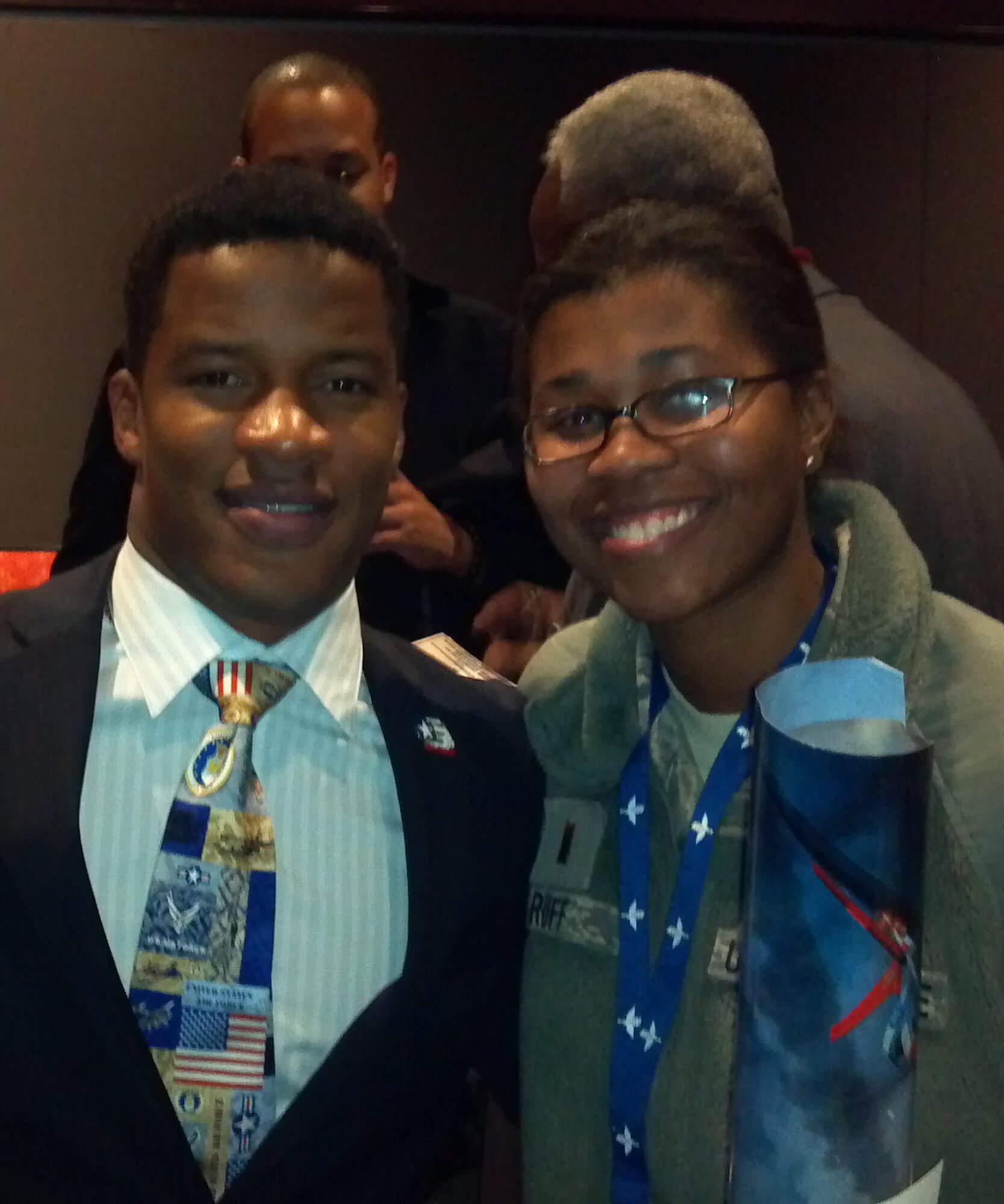 Nate Parker, star of the Lucasfilm Ltd. movie “Red Tails” poses with 2nd Lt. Brionna Ruff, 14th Flying Training Wing Public Affairs after a pre-screening of the movie on Jan. 13 at the San Antonio Lila Cockrell Theater. (U.S. Air Force photo/Capt. Jesper Stubbendorff)