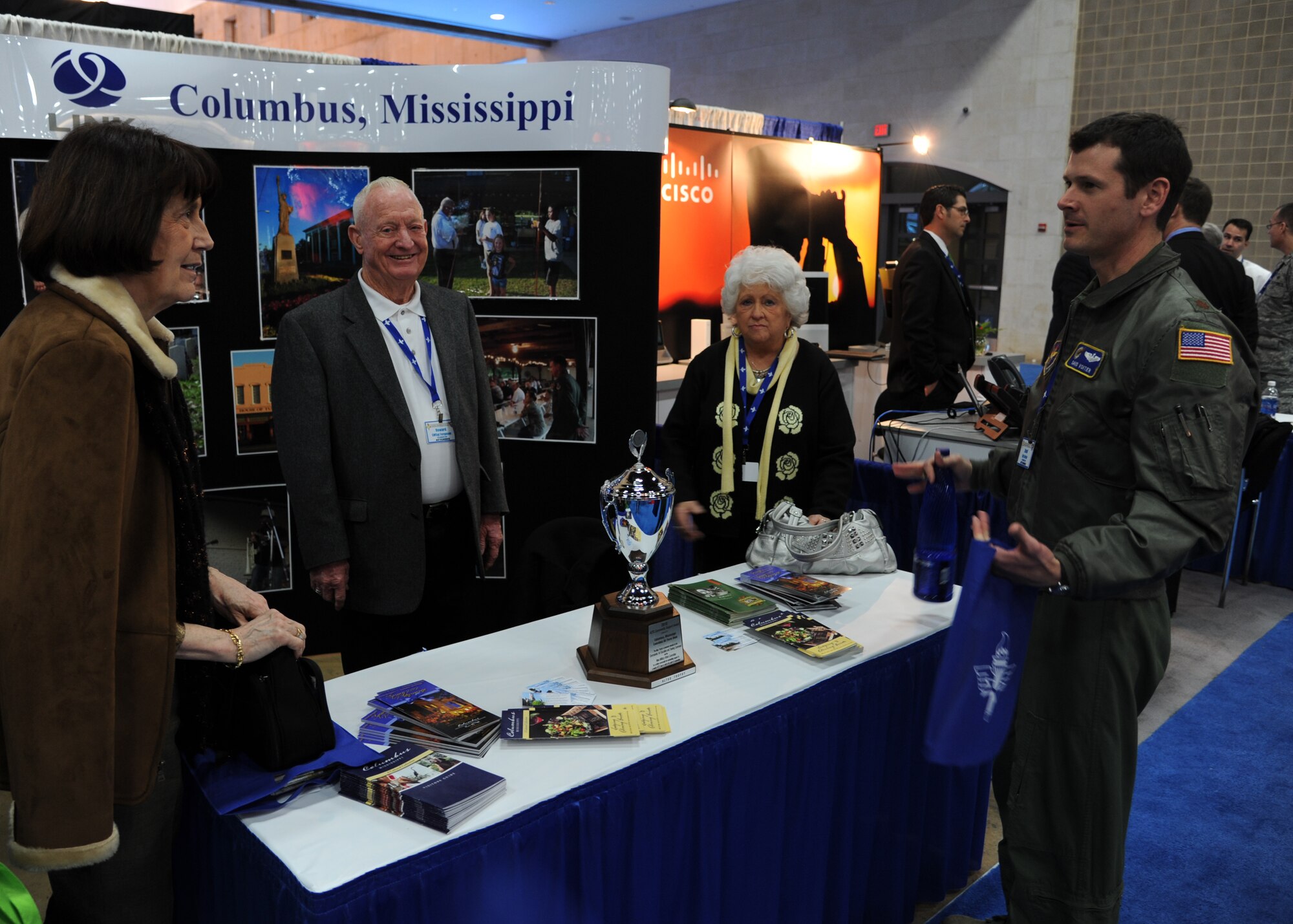 Maj. David Voitier, 41st Flying Training Squadron, checks out the Columbus LINK booth at the AETC Symposium Expo on Jan. 13. The Expo featured companies, products, Air Force organizations and more in the more than 120 vendor booths across the Expo floor. (U.S. Air Force photo/Airman 1st Class Chase Hedrick)
