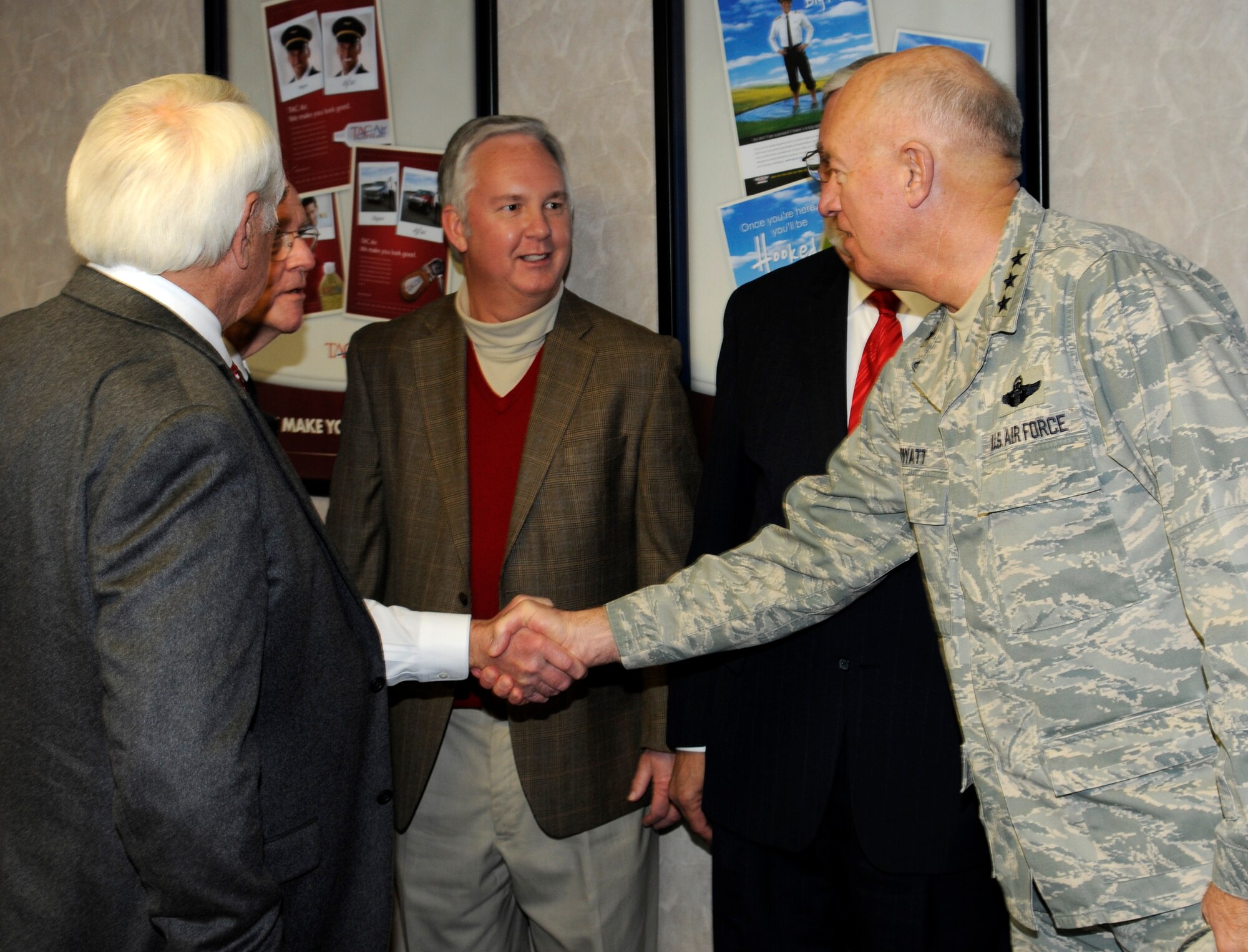 Lt. Gen. Harry M. Wyatt III, Director of the Air National Guard, right, visits with leaders from the City of Fort Smith. Wyatt visited the 188th Jan. 18 and met with unit and Arkansas National Guard leaders as well as city officials. Wyatt also was able to gauge the 188th’s capabilities and assets during a helicopter flight over Ebbing Air National Guard Base and Fort Chaffee Maneuver Training Center, where the 188th’s Detachment 1 Razorback Range is located. Wyatt was able to observe an exercise at Razorback Range involving the 188th’s A-10C Thunderbolt II “Warthogs” and the 188th Security Forces Squadron. (National Guard photo by Senior Master Sgt. Dennis Brambl/188th Fighter Wing Public Affairs)