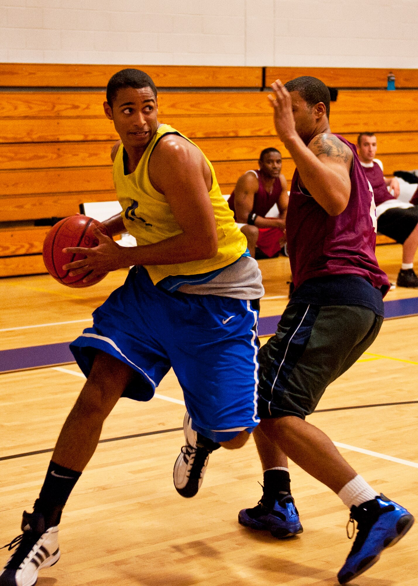 Sydney Sullivan, of the 96th Force Support Squadron team, drives to the basket around a 96th Logistics Readiness Squadron defender during the base intramural championship game at Eglin Air Force Base, Fla., Jan. 19.  FSS defeated the defending champion LRS team 54-45 in a close game.  FSS’s explosion of points in the final four minutes sealed the game. Sullivan had 19 points in the winning effort.  (U.S. Air Force photo/Samuel King Jr.)