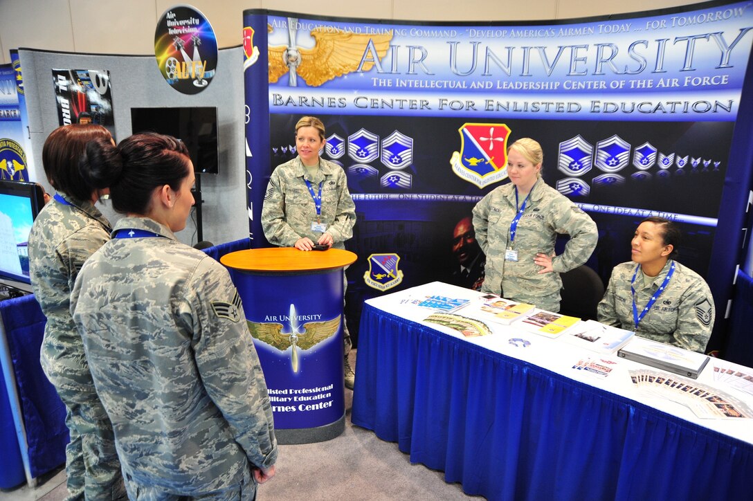 The staff of the Thomas Barnes Center for Enlisted Education attend the 2012 Air Education and Training Command Symposium, held Jan. 12-13 at the Henry B. Gonzalez Convention Center in San Antonio. More than 4,000 service members, civilians, and business and civic leaders attended the two-day event. Keeping with the event's theme, "Develop America's Airmen Today...for Tomorrow," the symposium featured more than 70 seminars and panels highlighting the leading education and training-related services in the military and industry. (Air Force photo/Airman 1st Class Christopher Stoltz)