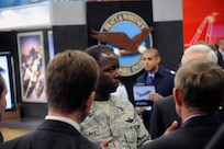 Gen. Edward A. Rice Jr., Air Education Training Command commander visits with  vendors who represent companies in the aerospace industry during the Air Education Training Command 2012 Symposium at the Henry B. Gonzalez Convention Center, San Antonio, Texas.  ( U.S. Air Force photo by Don Lindsey)