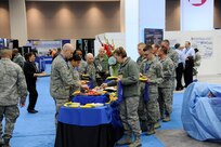 Attendees at the Air Education Training Command 2012 Symposium, San Antonio, Texas, enjoy breakfast with the vendors Jan. 12 - 13, 2012. (U.S. Air Force photo by Don Lindsey) 