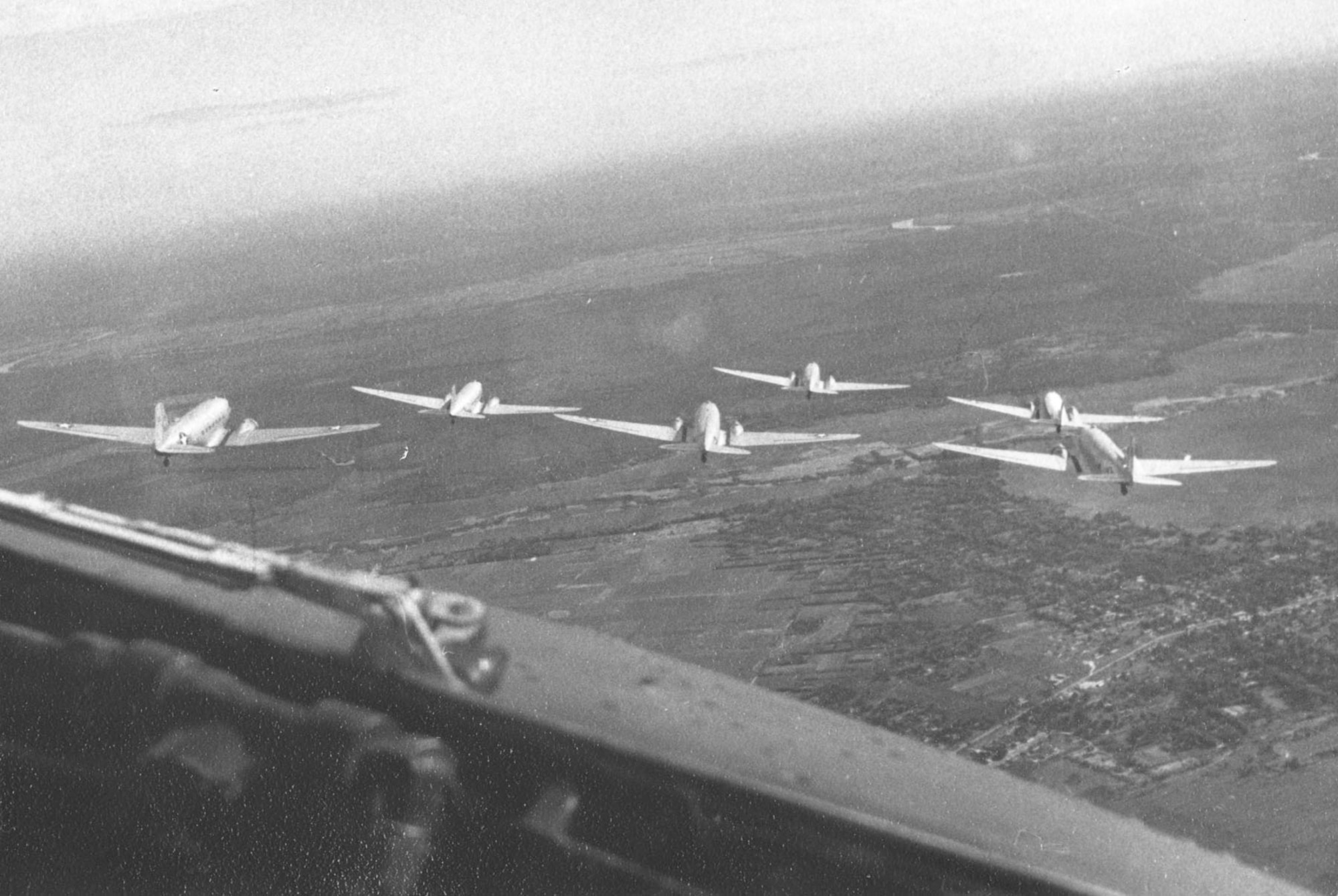 Formation of VNAF C-47s. This photograph was taken by a "Dirty Thirty" pilot from the co-pilot seat of another C-47. (U.S. Air Force photo)