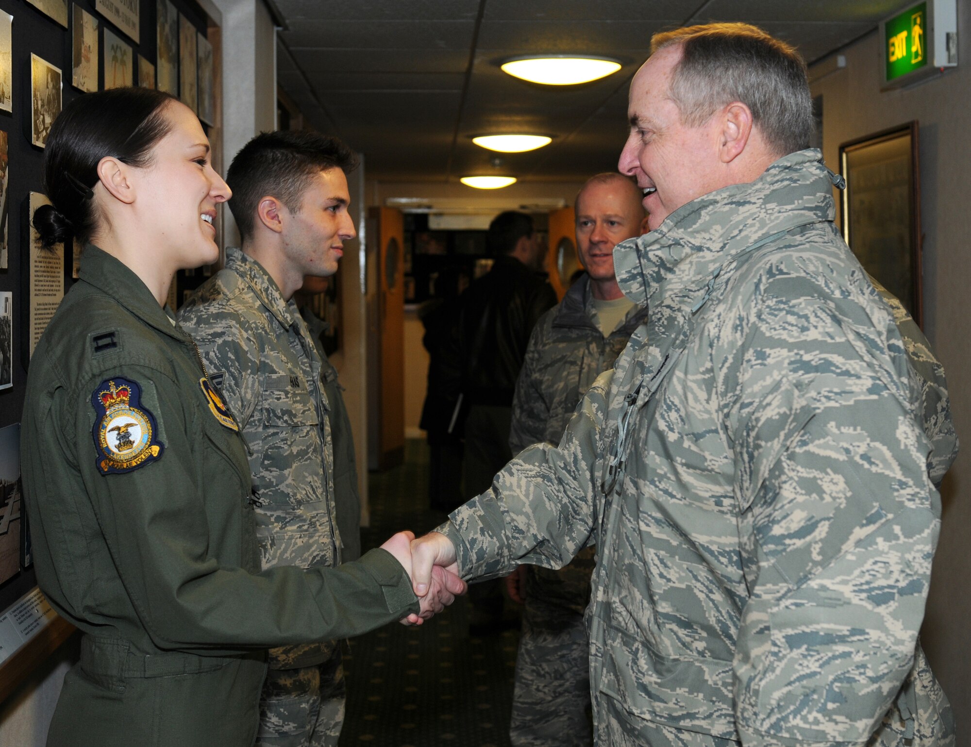 ROYAL AIR FORCE LAKENHEATH, England - Gen. Mark A. Welsh III (right), U. S. Air Forces in Europe commander, greets Capt. Ashley Thomas, 48th Aerospace Medical Squadron aerospace physiologist, during a visit Jan. 18, 2012. Welsh and Chief Master Sgt. David W. Williamson, USAFE command chief, visited RAF Lakenheath to express their gratitude for the hard work and dedication of the Liberty warriors and to explain upcoming changes in today's Air Force.  (U.S. Air Force photo by Airman 1st Class Cory D. Payne)