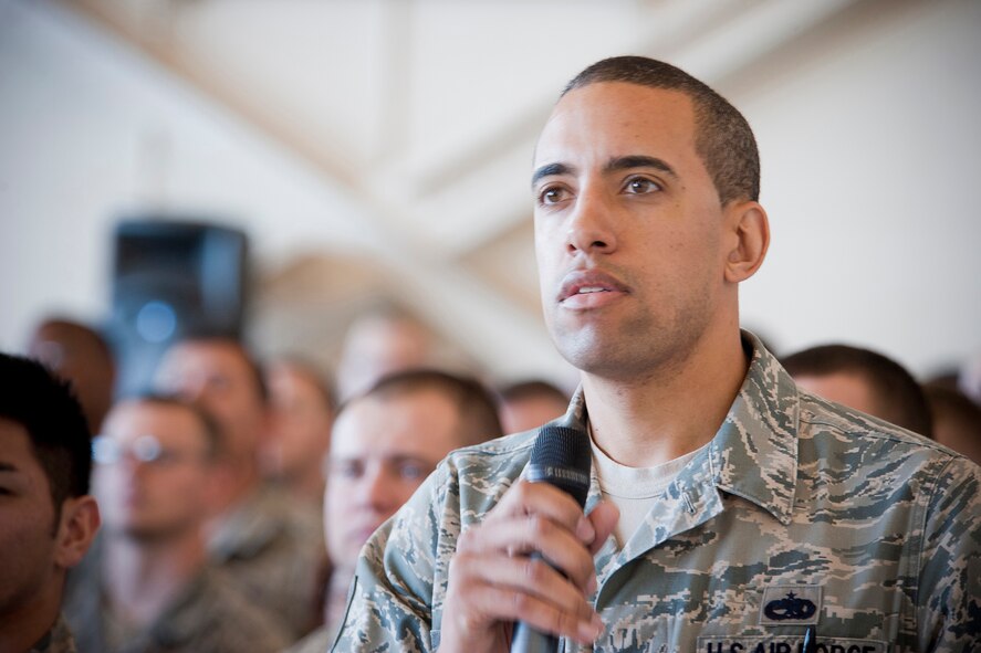 U.S. Air Force Tech. Sgt. Joshua Lynch, 23d Operations Support Squadron air traffic controller, asks Air Force Chief of Staff Gen. Norton Schwartz a question during an all-call at Moody Air Force Base, Ga., Jan. 18, 2012. Lynch asked the general for his views on possible changes in military retirement benefits. (U.S. Air Force photo by Staff Sgt. Jamal D. Sutter/Released)