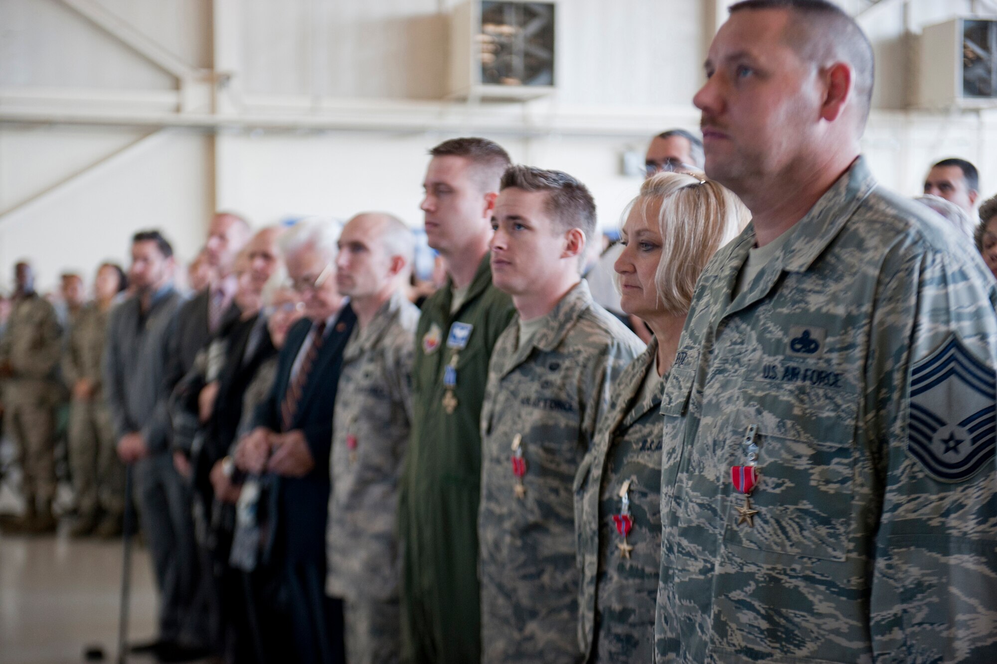 Bronze Star and Distinguished Flying Cross Medal recipients look on during an address from Air Force Chief of Staff Gen. Norton Schwartz at Moody Air Force Base, Ga., Jan. 18, 2012. Schwartz presented the medals during an all-call where he also spoke about current Air Force priorities and answered questions. (U.S. Air Force photo by Staff Sgt. Jamal D. Sutter/Released)