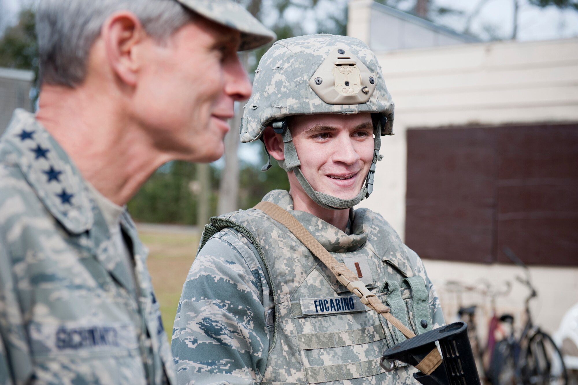 U.S. Air Force 2nd Lt. Michael Focarino, 824th Base Defense Squadron alpha flight leader, speaks with Air Force Chief of Staff Gen. Norton Schwartz during a military operation in urban terrain demonstration at Moody Air Force Base, Ga., Jan. 18, 2012. During the MOUT demonstration, Schwartz met with 820th Base Defense Group Airmen and viewed their deployed capabilities. (U.S. Air Force photo by Staff Sgt. Jamal D. Sutter/Released)