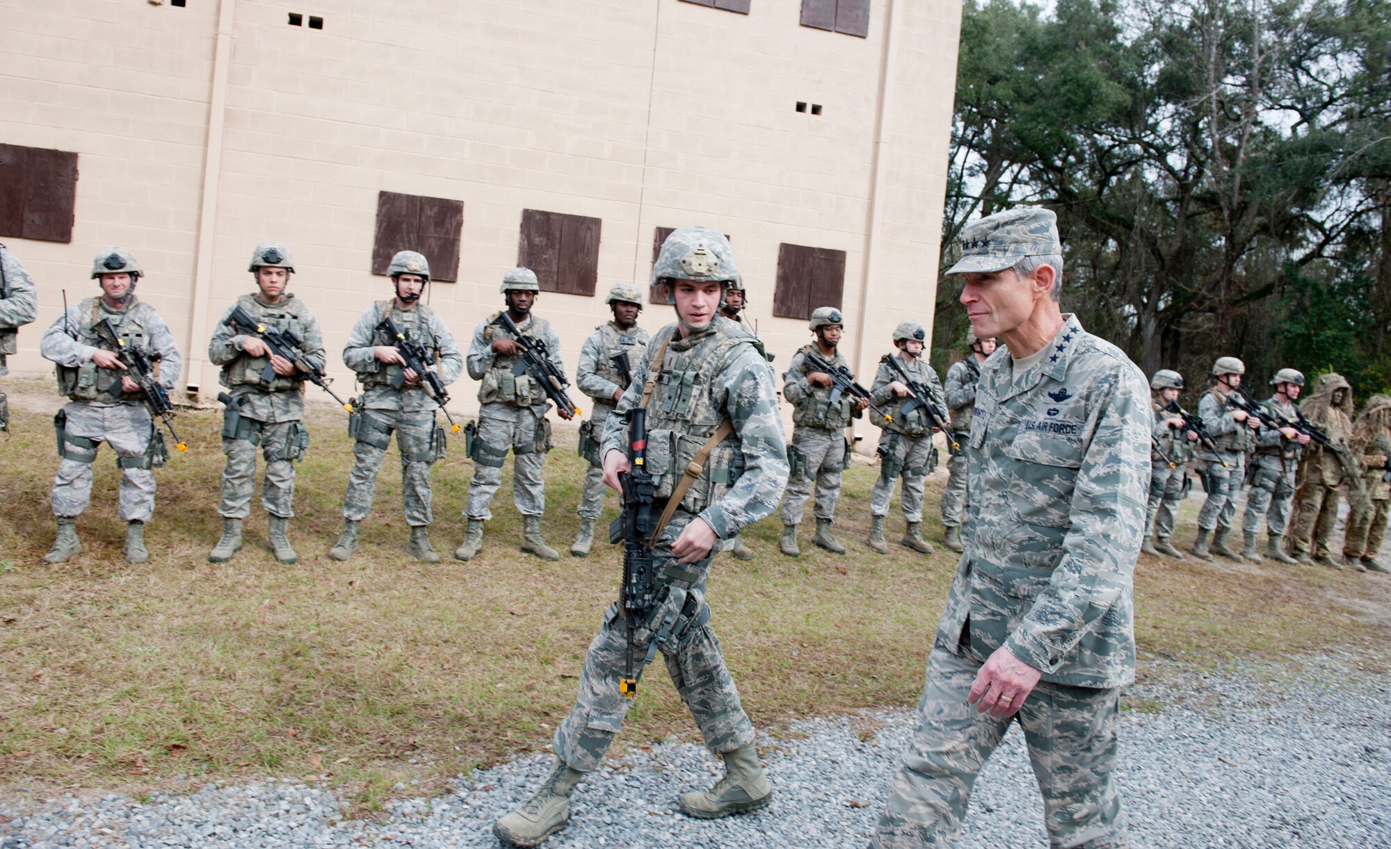 U.S. Air Force 2nd Lt. Michael Focarino, 824th Base Defense Squadron alpha flight leader, speaks with Air Force Chief of Staff Gen. Norton Schwartz during Schwartz’s visit with the 820th Base Defense Group at Moody Air Force Base, Ga., Jan. 18, 2012. Schwartz met with Airmen from the group and viewed a military operation in urban terrain demonstration, which showcased their capabilities when deployed downrange. (U.S. Air Force photo by Staff Sgt. Jamal D. Sutter/Released) 