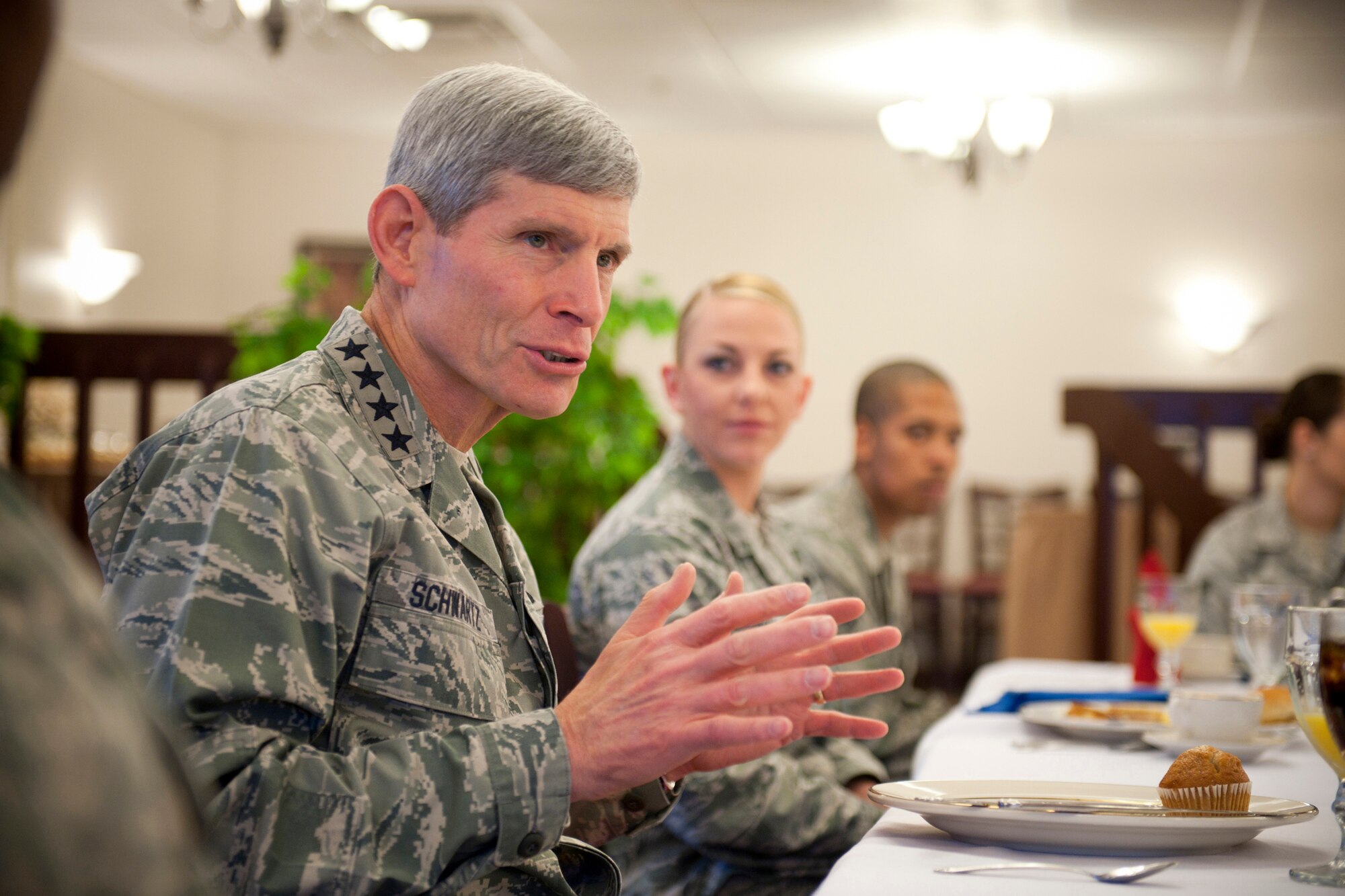 Air Force Chief of Staff Gen. Norton Schwartz speaks with Airmen during breakfast at the Georgia Pines Dining Facility at Moody Air Force Base, Ga., Jan. 18, 2012. Schwartz answered questions about career progression, changes in education benefits and the U.S. military’s departure from Iraq. He also commented on resiliency in the Air Force and programs available to help Airmen manage challenges. (U.S. Air Force photo by Staff Sgt. Jamal D. Sutter/Released)