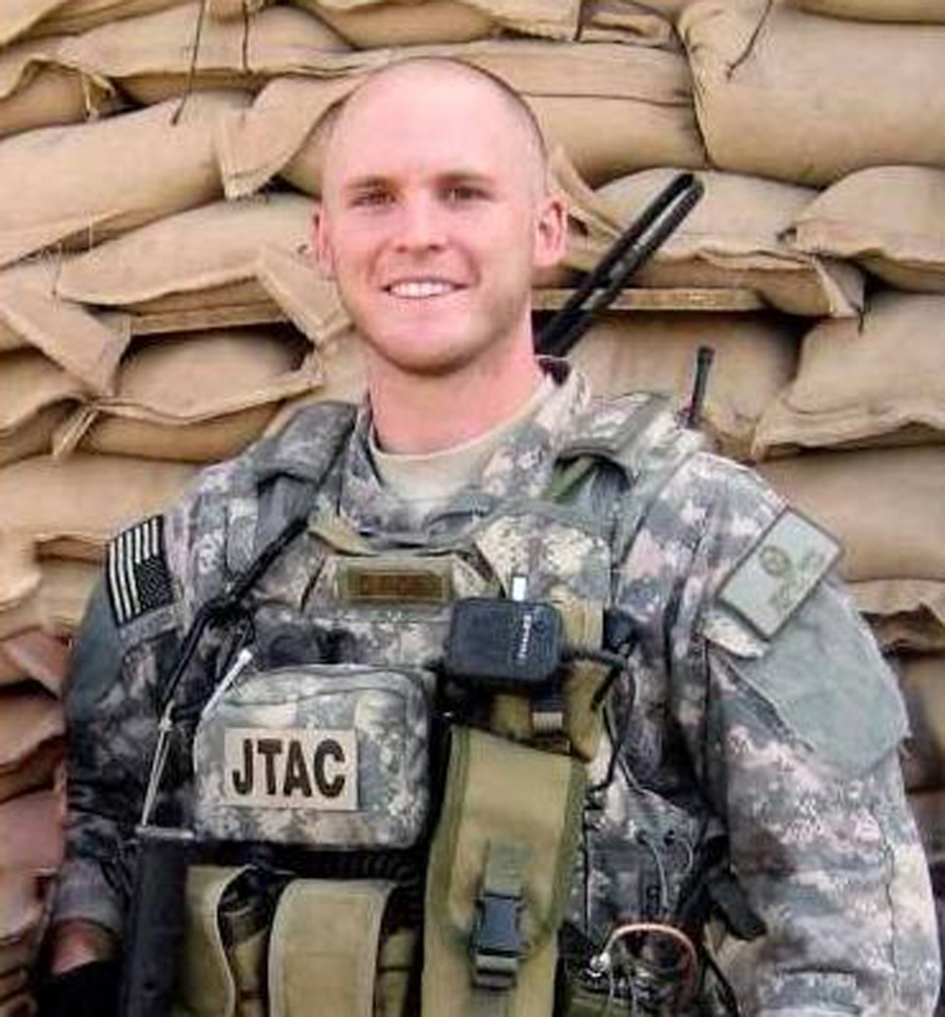 Senior Airman Bradley Smith poses for a photo during his Afghanistan deployment. An improvised explosive device attack mortally wounded Smith Jan. 3, 2010, in Afghanistan. Smith was assigned to the 10th Air Support Operations Squadron at Fort Riley, Kan. (Courtesy photo)
