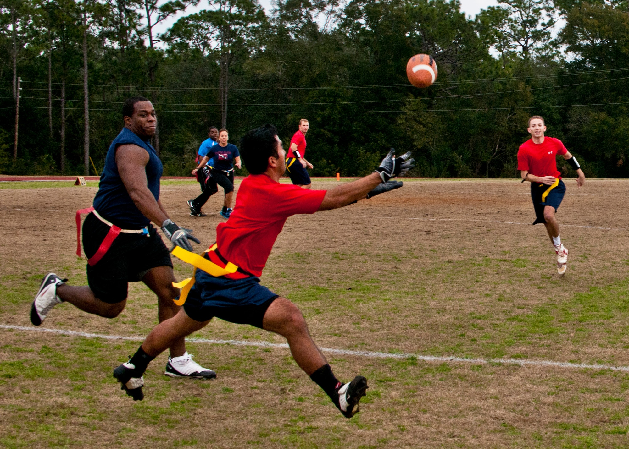 The Company Grade Officers Council goes for another touchdown during their flag-football game against the 5/6 Council team at Eglin Air Force Base, Fla. Jan. 20.  The CGOC shut out 5/6 38-0.  (U.S. Air Force photo/Samuel King Jr.)