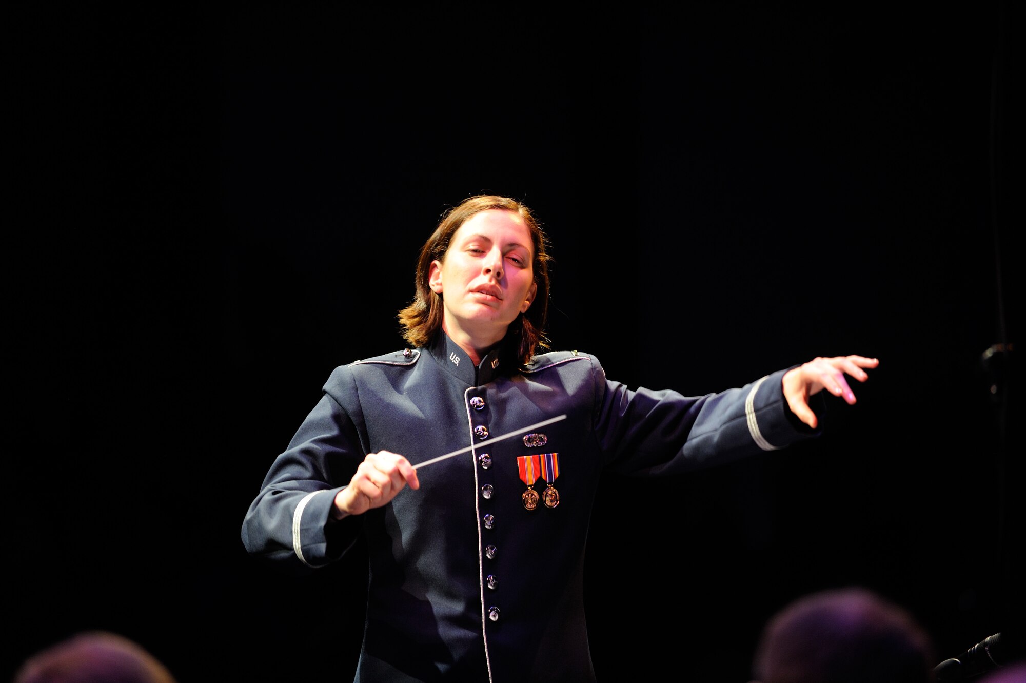 U.S. Air Force 2nd Lt. Shanti Nolan, a conductor with the U.S. Air Force Band Ceremonial Brass and a native of Vero Beach, Fla., conducts the Ceremonial Brass during a concert Jan. 20, 2012, in Palm Beach Gardens, Fla.  Nolan, the newest member of the U.S. Air Force Band, is leading the Ceremonial Brass is on their first American concert tour, playing at a dozen venues throughout Florida.  U.S. Air Force photo by Master Sgt. Adam M. Stump/Released.