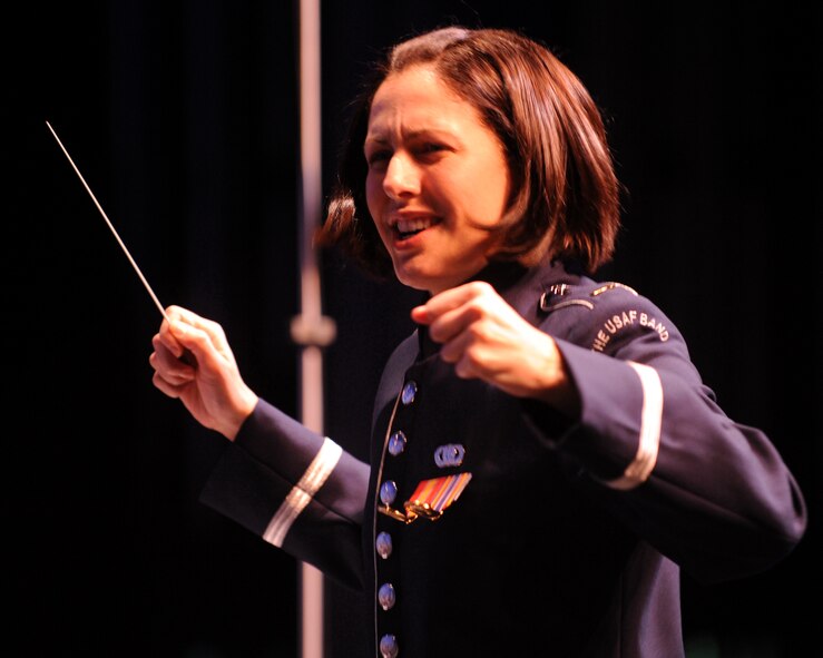 U.S. Air Force 2nd Lt. Shanti Nolan, a conductor with the U.S. Air Force Band Ceremonial Brass and a native of Vero Beach, Fla., conducts the Ceremonial Brass during a concert at the University of South Florida Concert Hall in Tampa, Fla., Jan. 12, 2012.  The Ceremonial Brass is on their first American concert tour, playing at a dozen venues throughout Florida.  U.S. Air Force photo by Master Sgt. Adam M. Stump/Released.