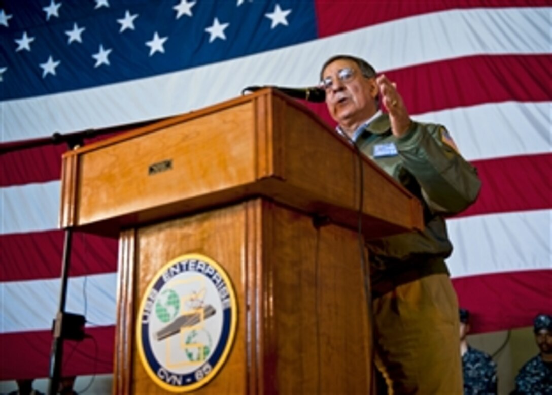 Defense Secretary Leon E. Panetta gives a speech in the hangar bay of aircraft carrier USS Enterprise in the Atlantic Ocean, Jan. 21, 2012. The Enterprise Carrier Strike Group is conducting a composite training unit exercise.