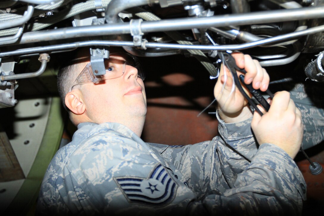 Tech. Sgt. Robert Feeley, a jet engine mechanic with the 108th Maintenance Squadron, repairs hydraulic lines on a KC-135 Stratotanker's engine Jan. 22. Airmen from the 108th MXS worked on a KC-135 Stratotanker during the 108th Wing's January Unit Training Assembly at Joint Base McGuire-Dix-Lakehurst, N.J. (U.S. Air Force photo by Staff Sgt. Armando Vasquez, 108th WG/PA)