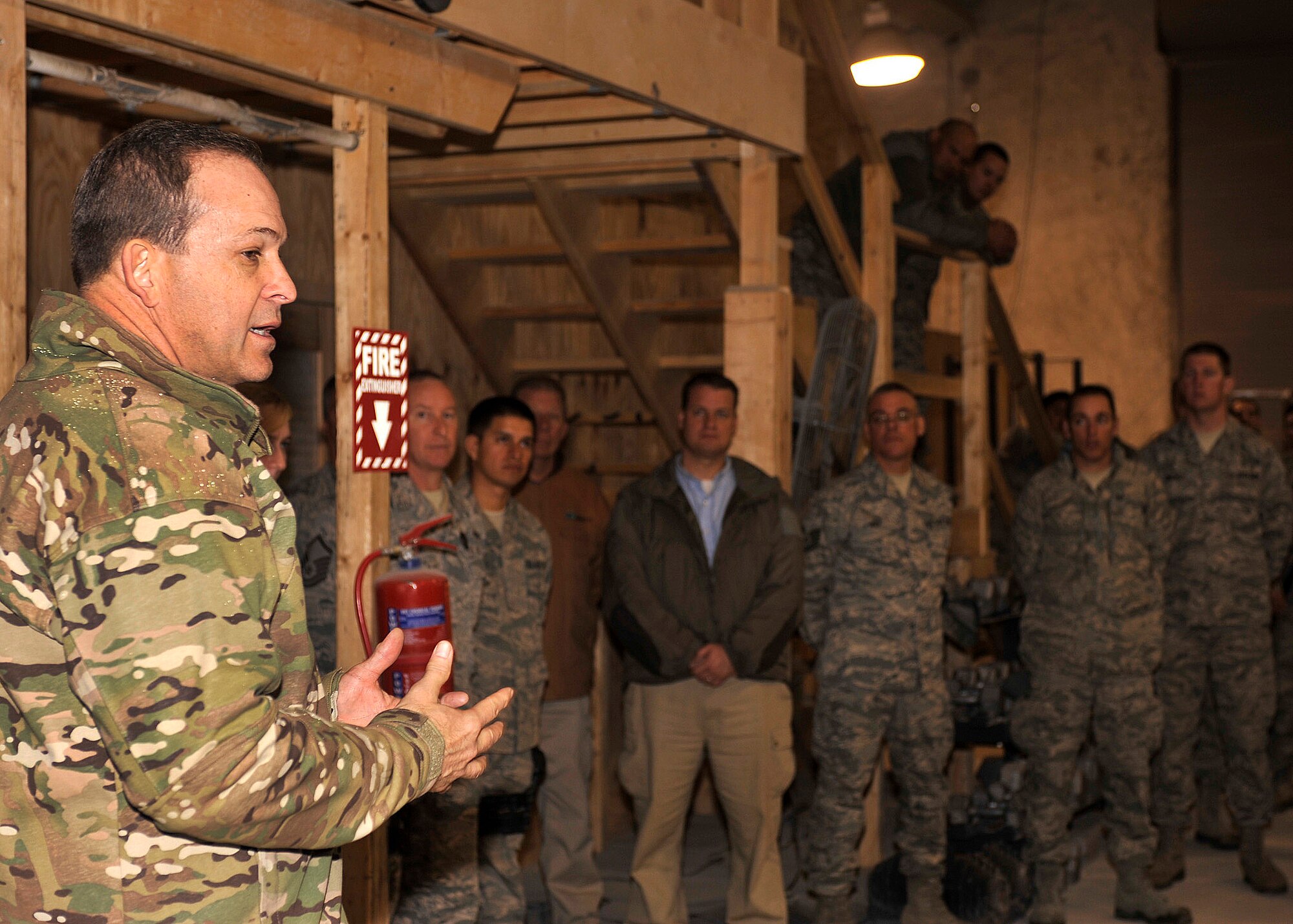 BAGRAM AIRFIELD, Afghanistan-- Maj. Gen. Timothy A. Byers speaks to the members of the 455th Expeditionary Civil Engineer Squadron at Bagram Airfield, Jan. 22, 2012. Byers is the commander of Air Force Civil Engineers, Headquarters, Washington, D.C. During his visit to Bagram he talked to members of all his deployed units. (U.S. Air Force photo/ Airman 1st Class Ericka Engblom)
