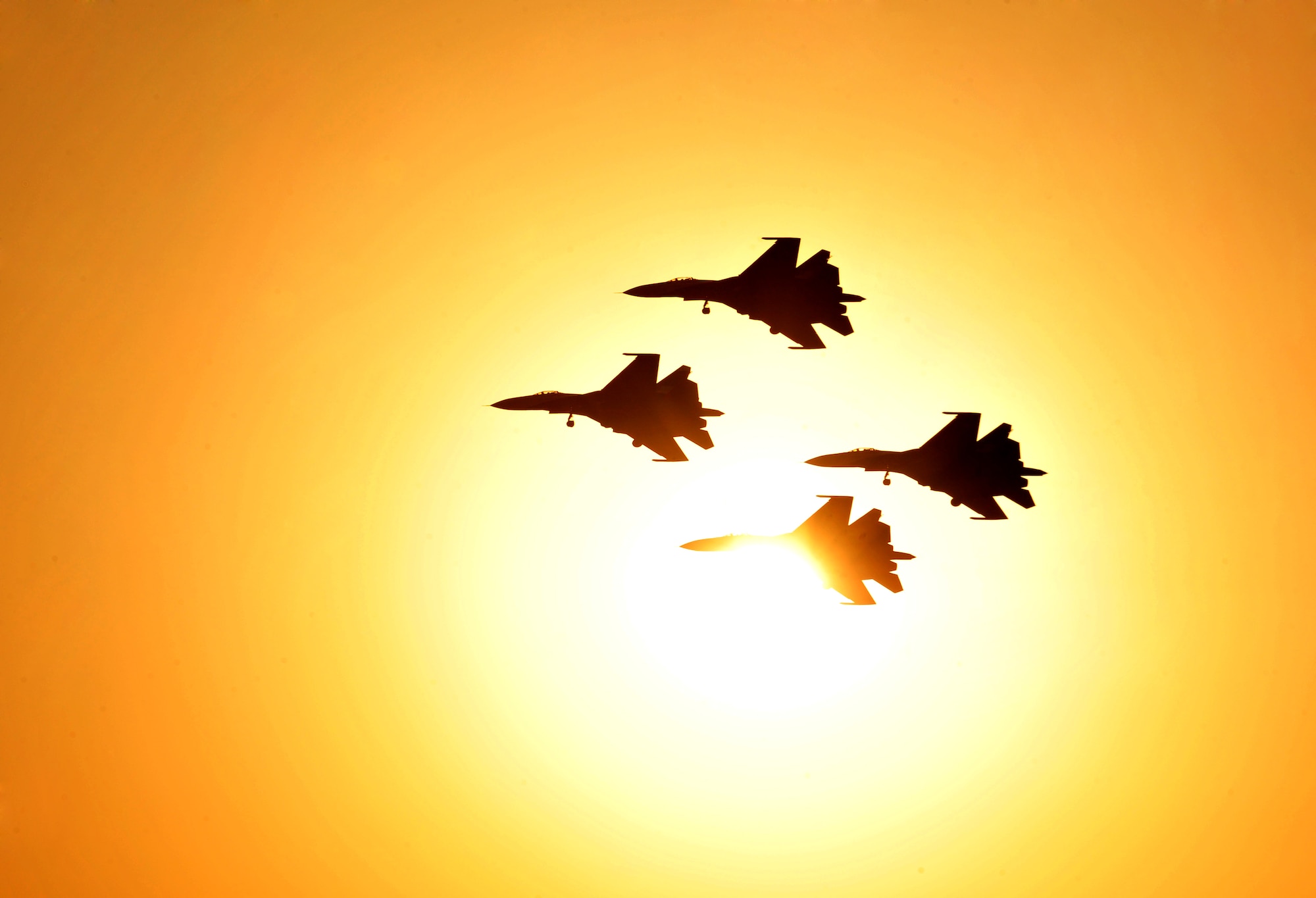 Members of the Russian Knights display team participate in the Bahrain International Airshow 2012 at Shakir Air Base, Bahrain Jan. 19, 2012. This event strengthens partnerships in the region and allows the United States and coalition and partner nations to work together to promote security, stability and mutual interests in the region. The U.S. Air Force showcased a variety of military aircraft through static displays, including the C-17 Globemaster III, C-130H Hercules, and F-15E Strike Eagle. Additionally, a large number of aircrew and support personnel from bases in Southwest Asia, Europe, and the United States were available to answer questions about the aircraft technology and capabilities. (U.S. Air Force photo by Staff Sgt. Andy M. Kin)