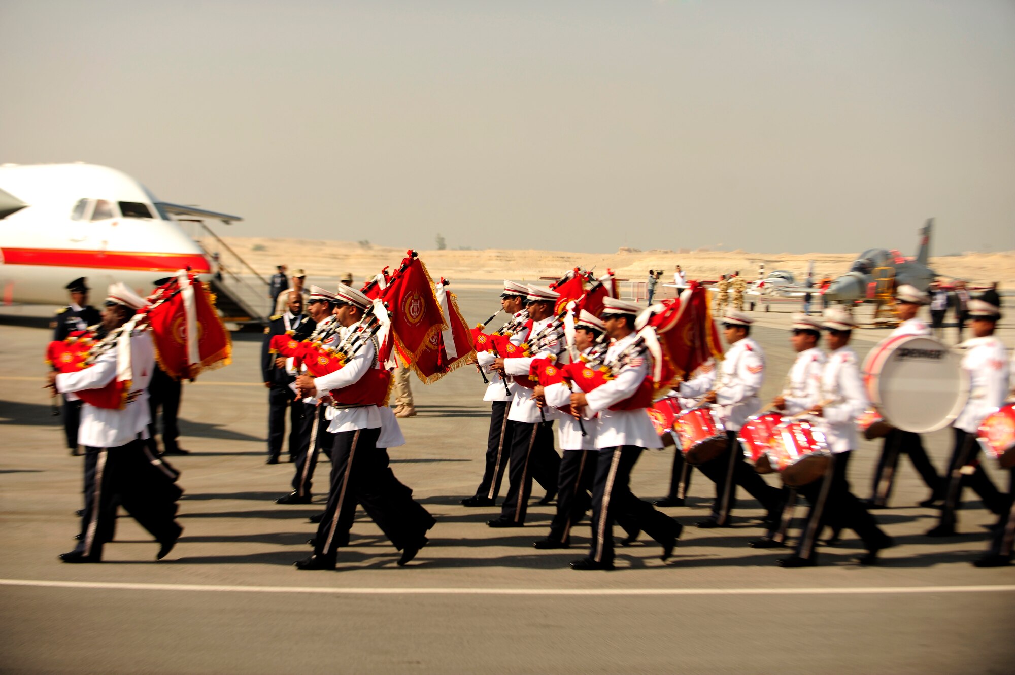 The Bahrain Band plays during the official opening ceremony at the Bahrain International Airshow 2012 at Shakir Air Base, Bahrain Jan. 19, 2012. This event strengthens partnerships in the region and allows the United States and coalition and partner nations, work together to promote security, stability and mutual interests in the region. The U.S. Air Force showcased a variety of military aircraft through static displays, including the C-17 Globemaster III, C-130H Hercules, and F-15E Strike Eagle. Additionally, a large number of aircrew and support personnel from bases in Southwest Asia, Europe, and the United States were available to answer questions about the aircraft technology and capabilities. (U.S. Air Force photo by Staff Sgt. Andy M. Kin)  