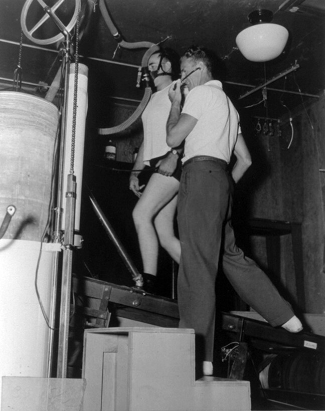1959 -- Personnel from the School of Aviation Medicine check out pressure suit equipment as they prepare for a 10-day stay in a sealed altitude chamber at Randolph. (Courtesy photo)